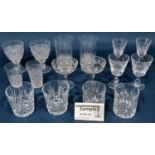A suite of near matching star cut glass ware including wine glasses brandy, Champagne bowls