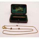 Antique 15ct bar brooch with engraved initials 'A.D.H', 3.4g, contained in a period case, together