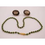 Green hardstone (possibly jade) and yellow metal bead necklace with clasp stamped '750 CBLd',