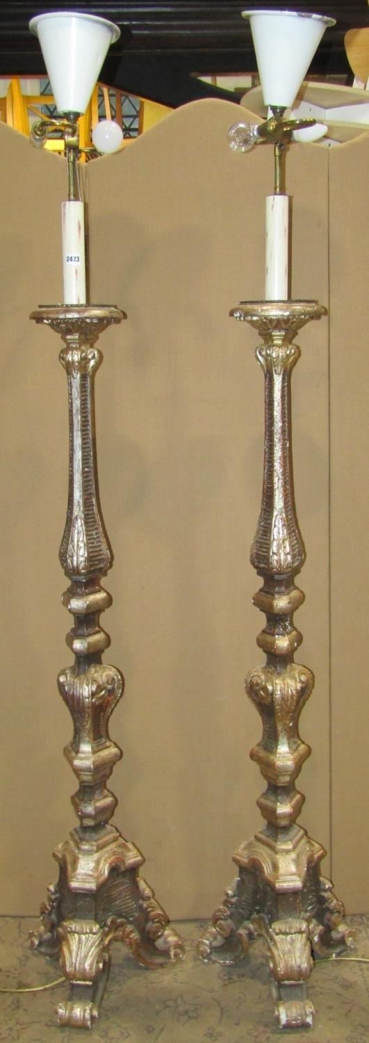 A pair of 18th century style standard lamps with scrolled supports 202 cm (full height)
