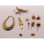 Collection of 9ct jewellery comprising a pixie charm and various earrings, plus a yellow metal