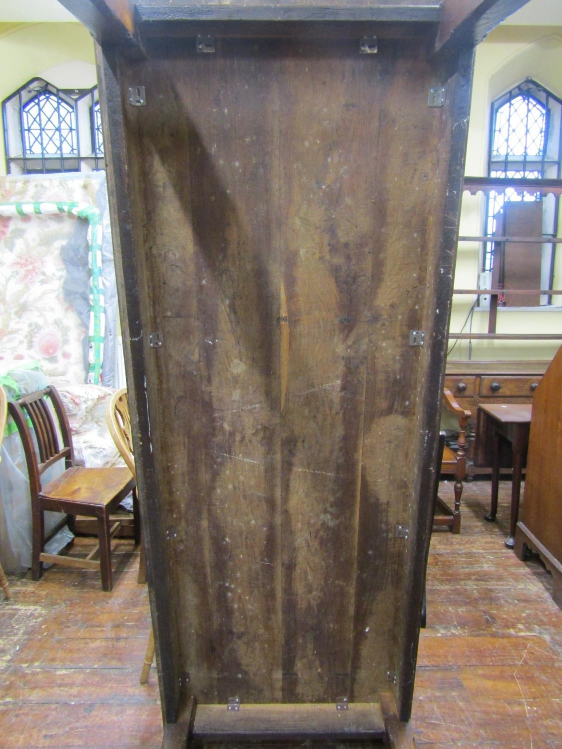 A Georgian oak farmhouse kitchen table, the plank top raised on chaffered supports, united by end - Image 4 of 5