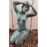 Figurative resin bronze sculpture 'Nixie' by Christine Baxter with weathered verdigris finish,