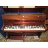 A Zender upright iron framed and overstrung piano in polished case stamped to iron frame MXB type