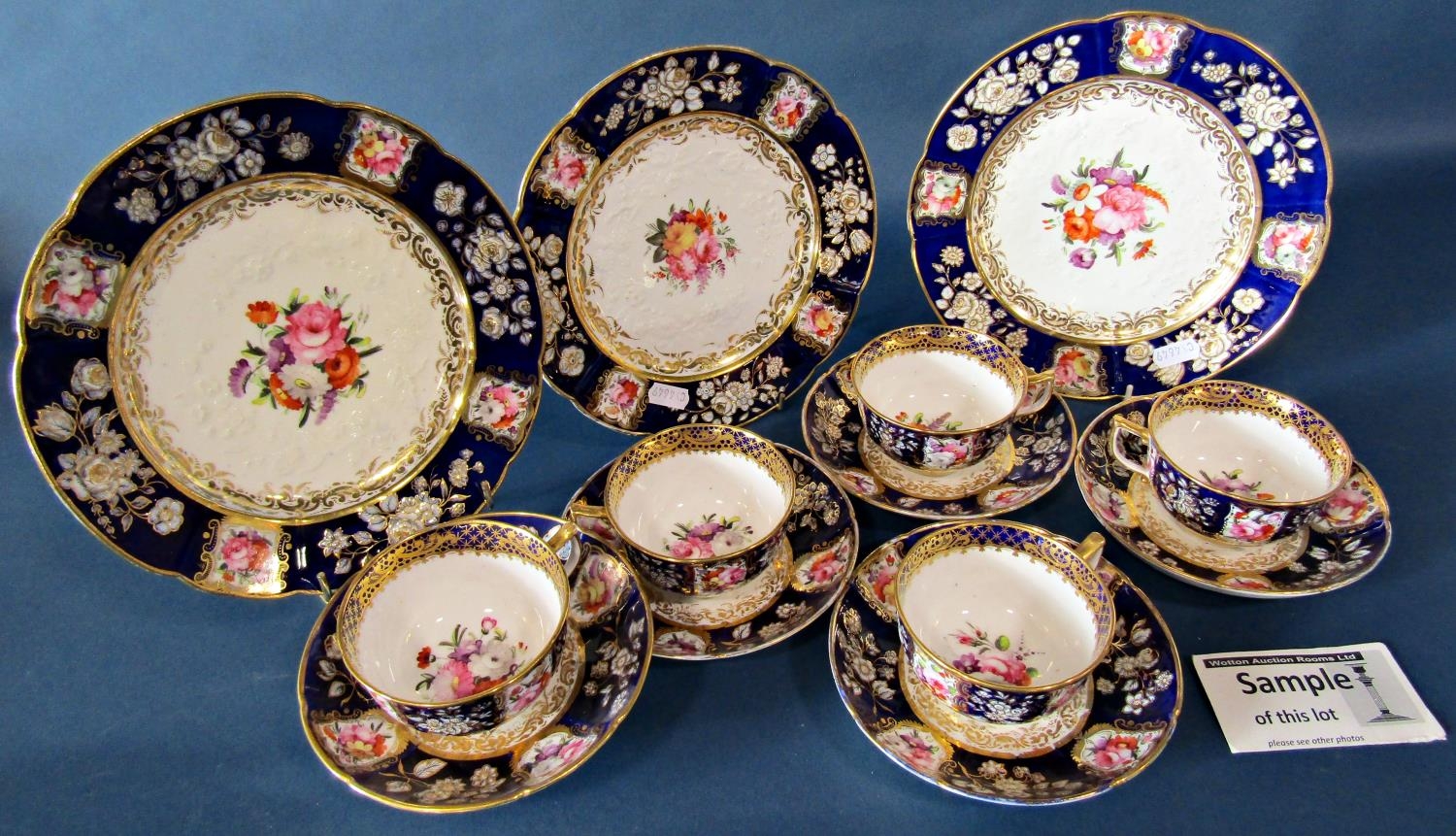 An early 19th century hand painted tea set with colourful hand painted floral panels, set with