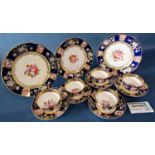 An early 19th century hand painted tea set with colourful hand painted floral panels, set with