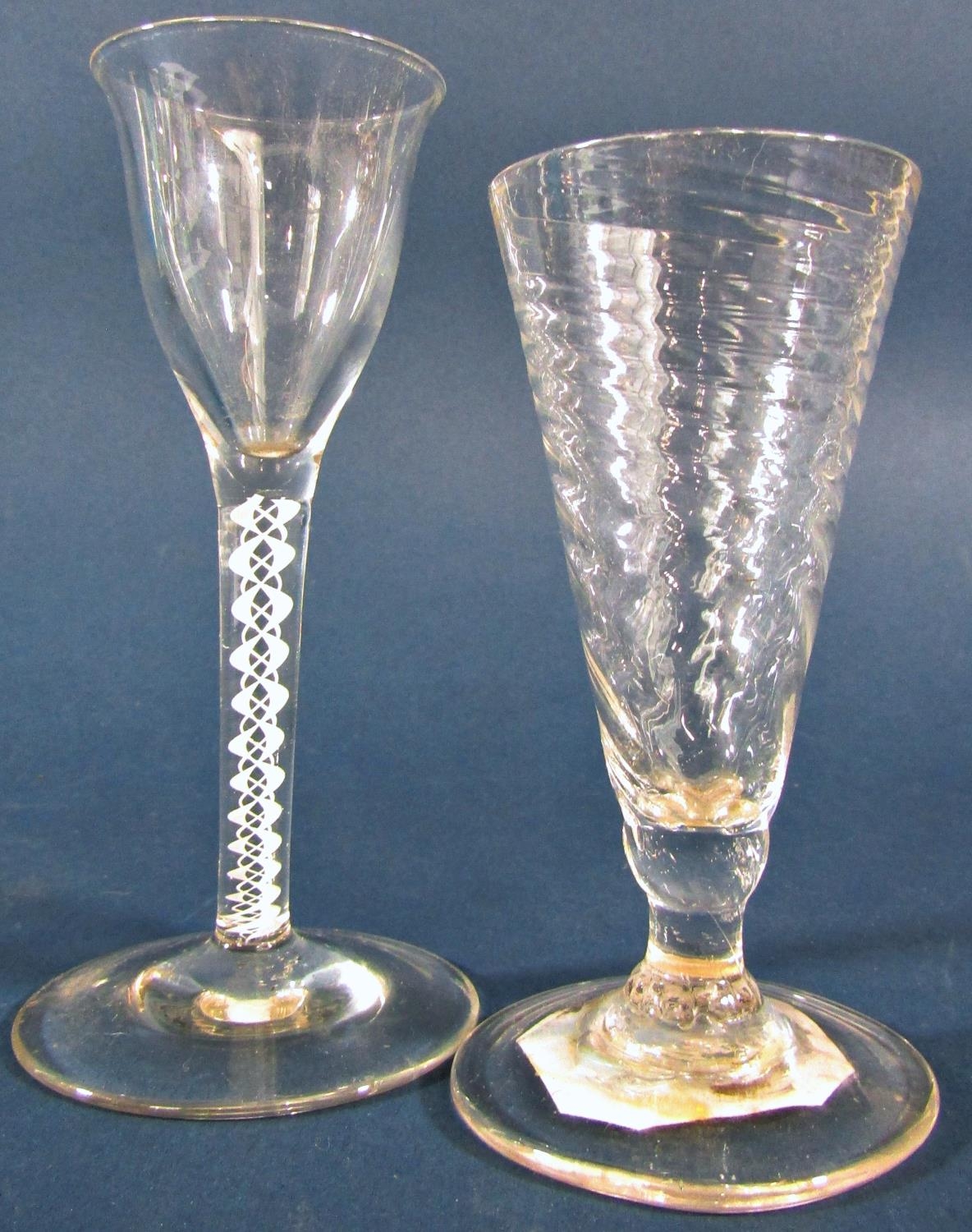 A Georgian funnel bowl wine glass with a double series air twist stem 15cm high, and a Georgian