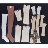 Collection of late 19th to mid 20th century stockings and gloves, including 1940's brown silk/