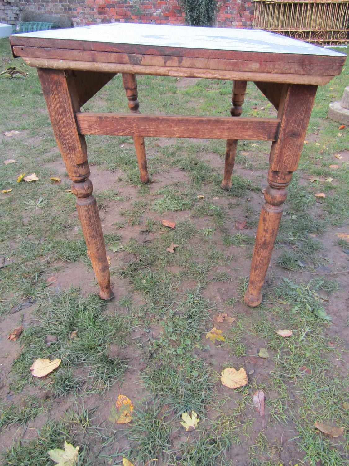 A Victorian stained pine kitchen table of rectangular form with later formica top, 107 cm x 68 cm ( - Image 3 of 3