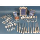 Three silver plated photo frames, loose silver plated flatware for six settings, main knives, main