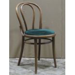 A set of eight Bentwood café chairs with circular upholstered pad seats