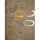 Two gilt painted wooden letters D & N together with seven steel letters