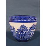A Mintons blue and white transfer printed jardinière with Willow pattern panels within a repeating
