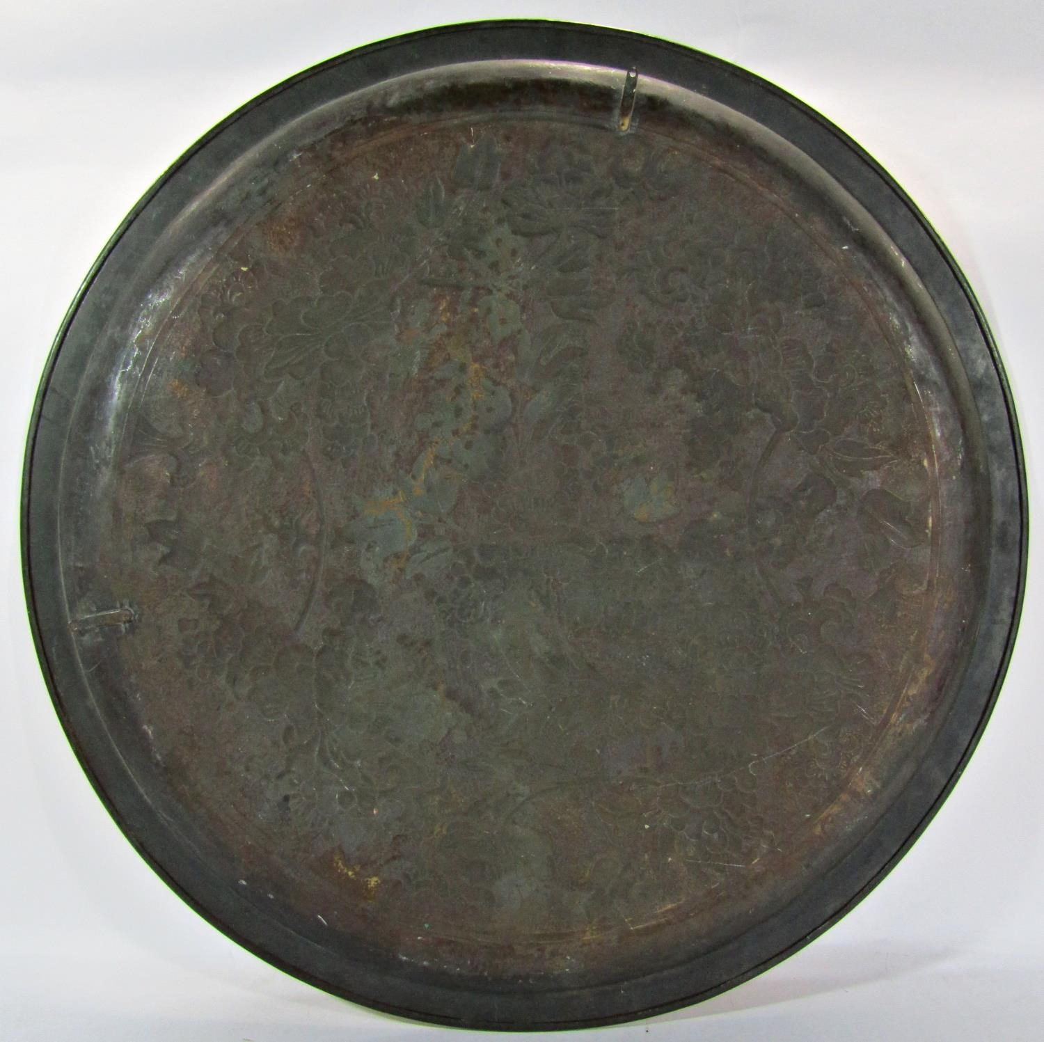 A 19th century KSIA (Keswick School of Industrial Arts) large brass floral embossed charger, 63cm - Image 2 of 2