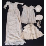 An interesting collection of late 19th / early 20th century baby gowns and clothing including 2 baby