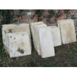 21 composition stone paving slabs, varying size, largest examples 60 cm square