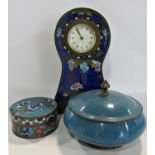 An Art Deco style cloisonné mantel clock, 20cm tall, a cloisonné pill box and a further blue fish