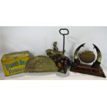 A miscellaneous collection of items including a bowling ball door stop, a Victorian table top dinner