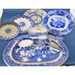 A collection of 19th century and other blue and white transfer printed ware to include graduated