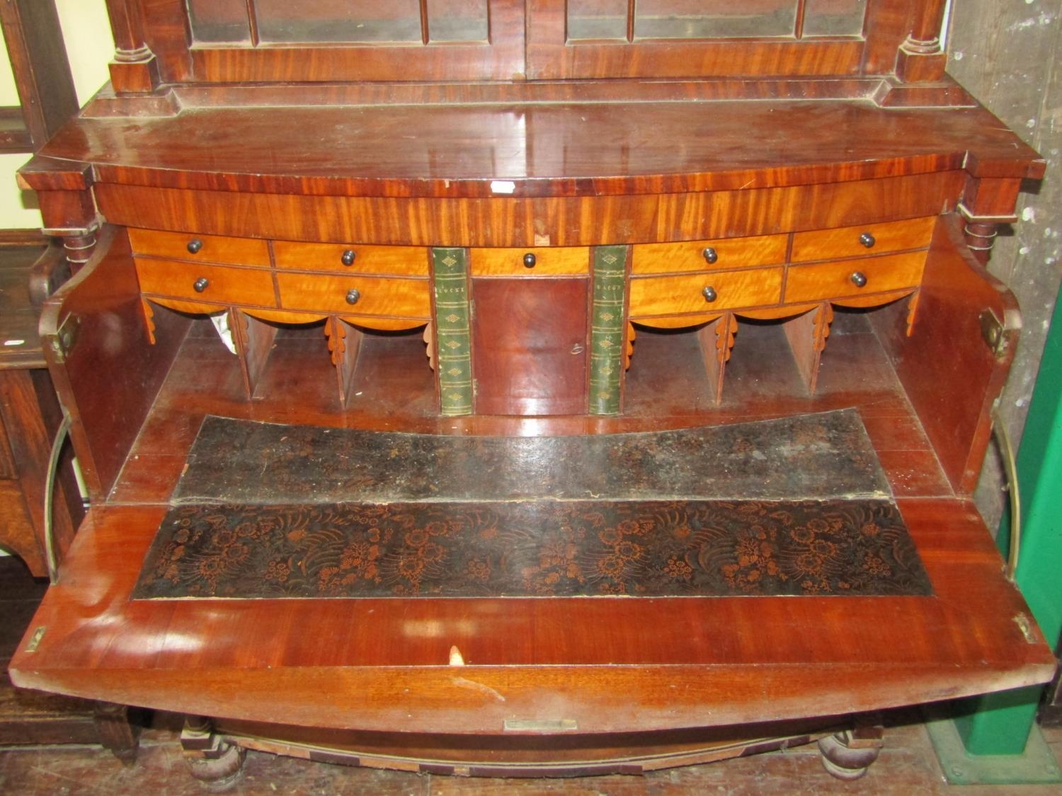 A regency mahogany secretaire bookcase, the base of bow fronted outline fitted with two deep - Image 2 of 5