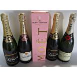 Fourteen bottles of champagne including four champagnes by Jacquart, a single bottle of Tattinger,