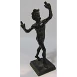 A bronze Grand Tour Pompeii Dancing Faun after the original, wood on a plinth 16cm tall.