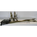 A pair of 19th century brass fire tongs and shovel together with a pair of brass andirons