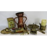 A mixed selection of brass and copper ware including a copper funnel, copper two handled flagon,