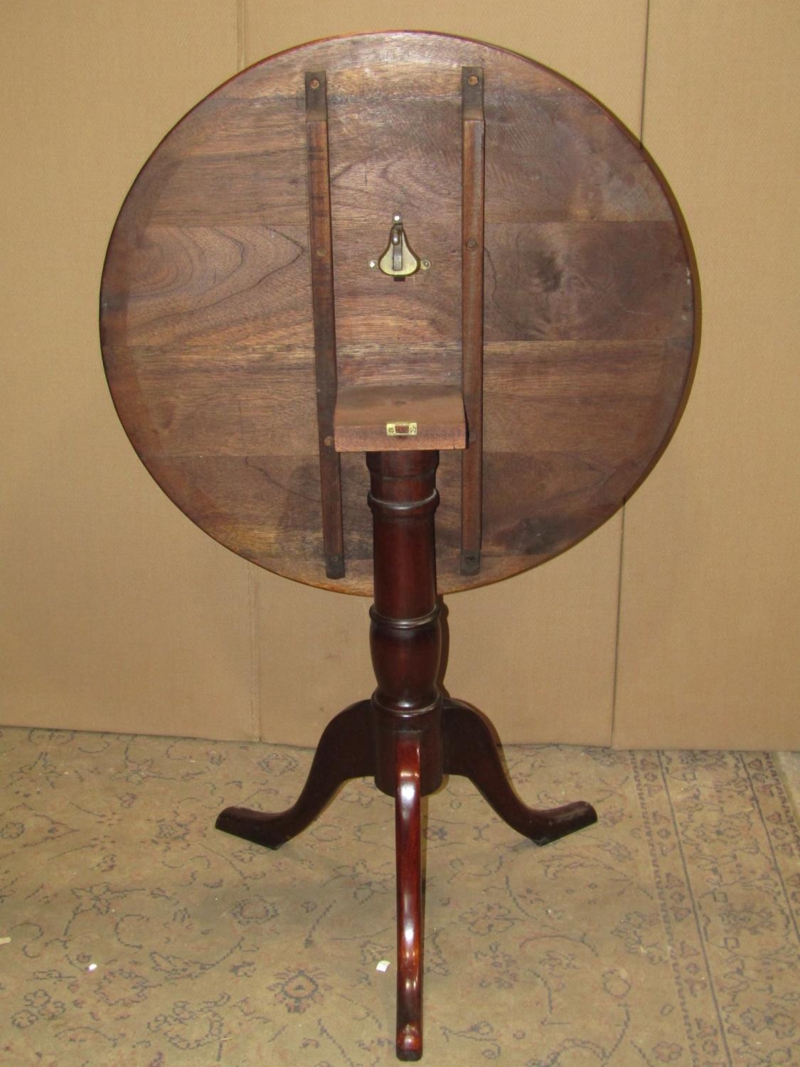 A Georgian style mahogany circular snap top occasional table, raise on a pillar tripod base, 72cm - Image 2 of 2