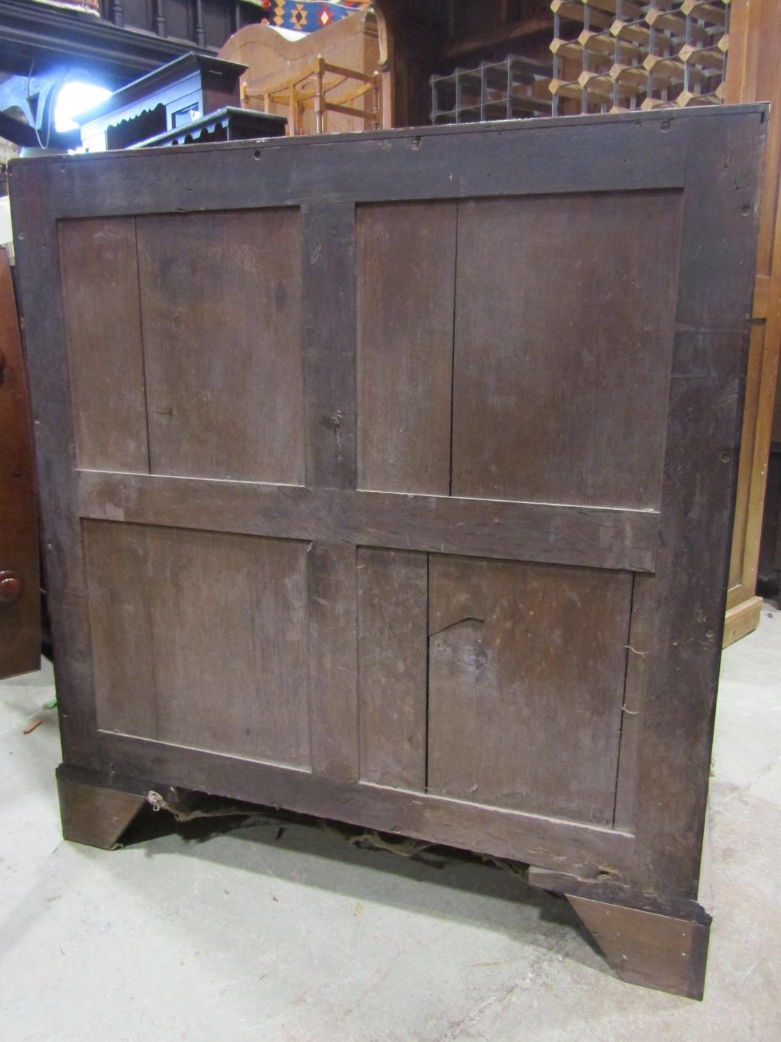 A Georgian mahogany bureau, the fall flap enclosing a fitted interior of small drawers, pigeon holes - Image 3 of 3