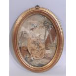 Georgian silk needlework of a young lady in gilt oval frame and glazed, 24 x 18 cm