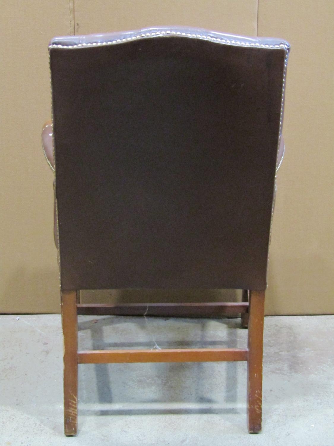 A reproduction Georgian style open armchair with dark brown faux leather upholstered seat and button - Image 2 of 2