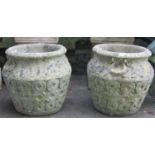 A pair of Cotswold Studios weathered composition stone garden urns, approx 40 cm diameter x 40 cm