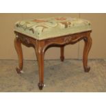 19th century rose wood stool with floral tapestry upholstered seat raised on scrolled cabriole