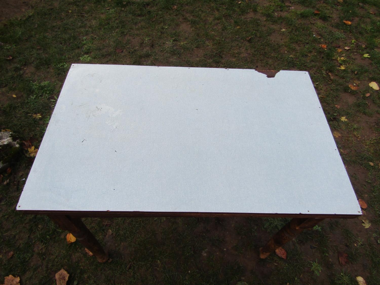 A Victorian stained pine kitchen table of rectangular form with later formica top, 107 cm x 68 cm ( - Image 2 of 3