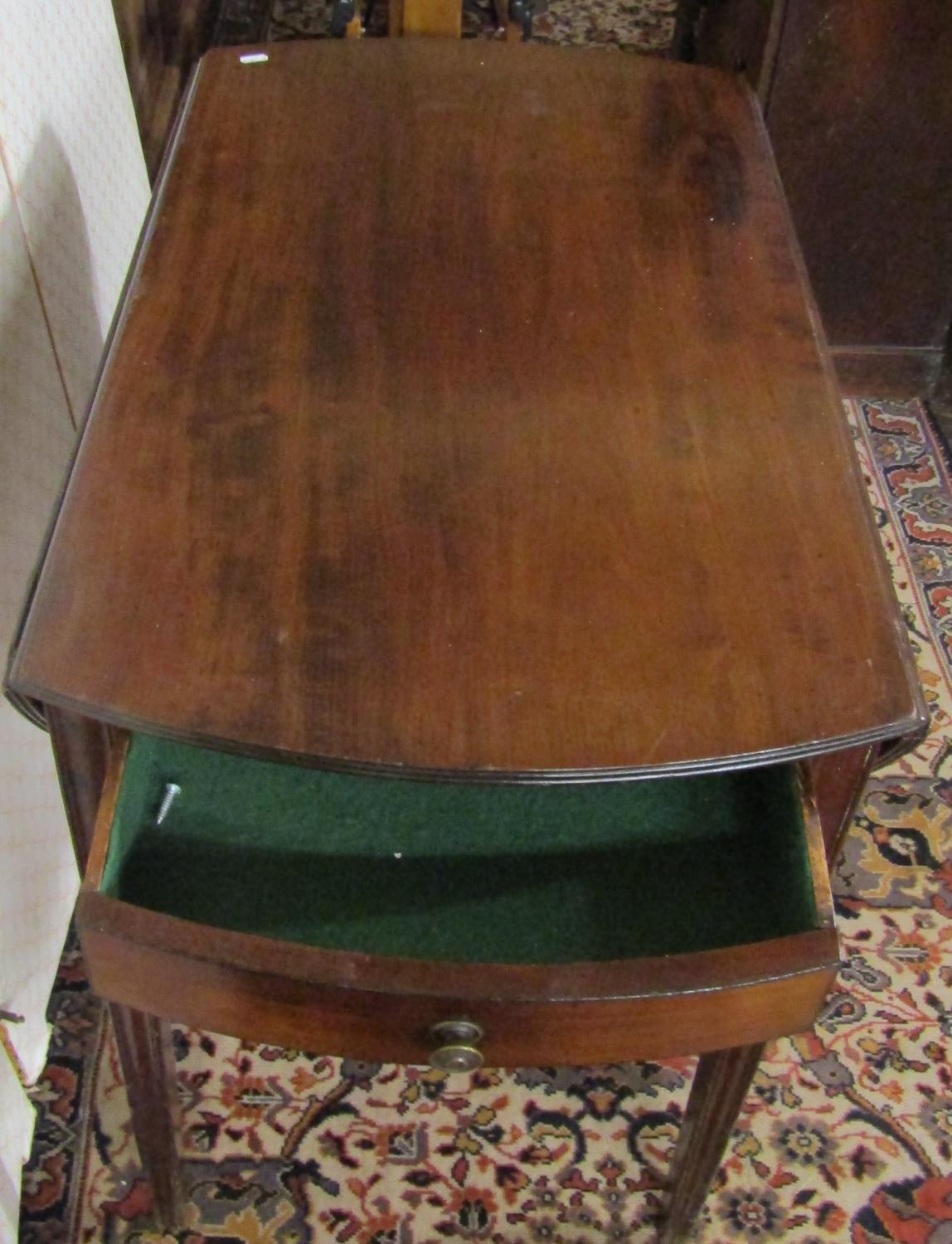 A 19th century mahogany oval Pembroke table with frieze drawer raised on square tapered supports - Image 3 of 7