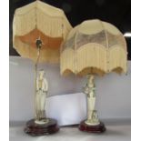 Two table lamps by Giuseppe Armani, of two fashionable ladies, both lamps with domed silk shades.