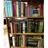 An extensive collection of books about Sherlock Holmes (three shelves)