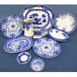 A quantity of 19th century and later blue and white printed ware including meat plates, dinner