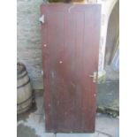 A reclaimed contemporary stained hardwood front door, 2 metres high x 83 cm wide