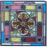 Edwardian lead stained glass panel with roundels and floral decoration, 50 x 50cm, and an Arts and
