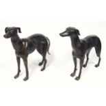 Pair of bronze models of greyhounds, standing, the male with a repaired ear, H 29.5cm and 28.5cm (2)