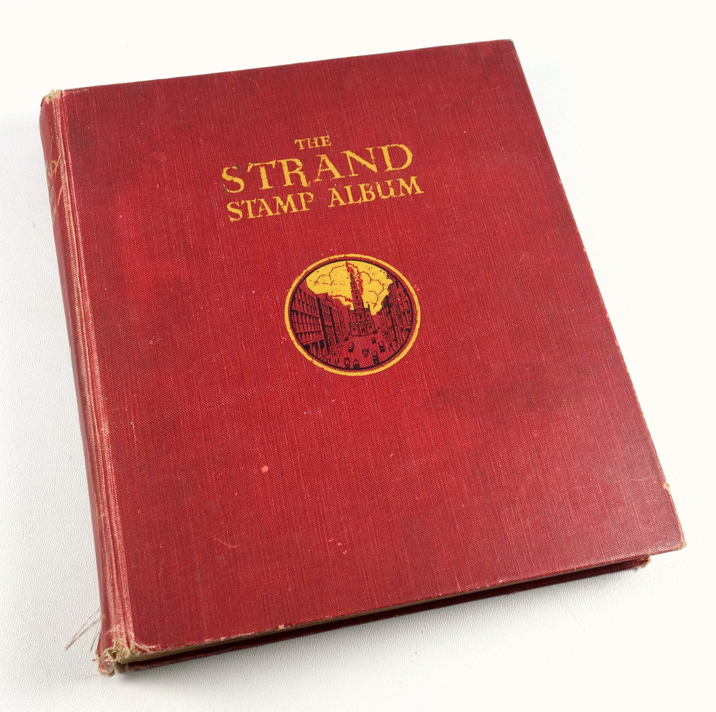 The Strand Stamp Album containing George V and later British Commonwealth and other postage stamps