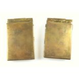 WW2 German brass cigarette cases and lighters both stamped with Nazi emblems, largest L. 10.2cm (2)