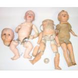Assorted doll parts to include a Kammer & Reinhardt bisque head with feathered eye brows, blue eyes,
