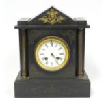 French mantel clock with a white enamelled circular dial enclosing an 8 day movement striking on a