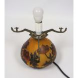 Gallé style table lamp with red floral overlay on an orange ground, with shade, H 27cm overall