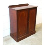 Edwardian inlaid mahogany cabinet with two panelled doors H. 95 cm, W. 76 cm, D. 40.5 cm overall.