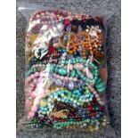 Large quantity of necklaces and other costume jewellery, 4.3 kg approx. (a lot)