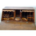 George III mahogany bureau with a good shaped fitted interior with a central panelled door and